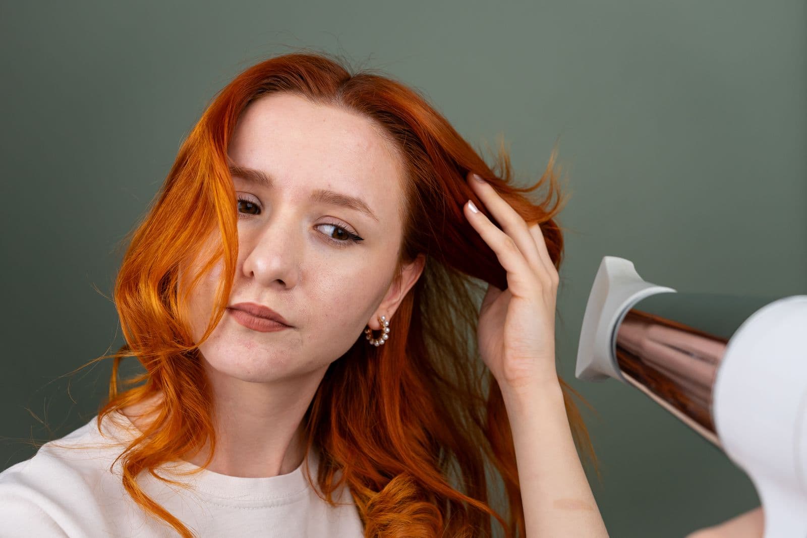 Long hair being blow dried section by section