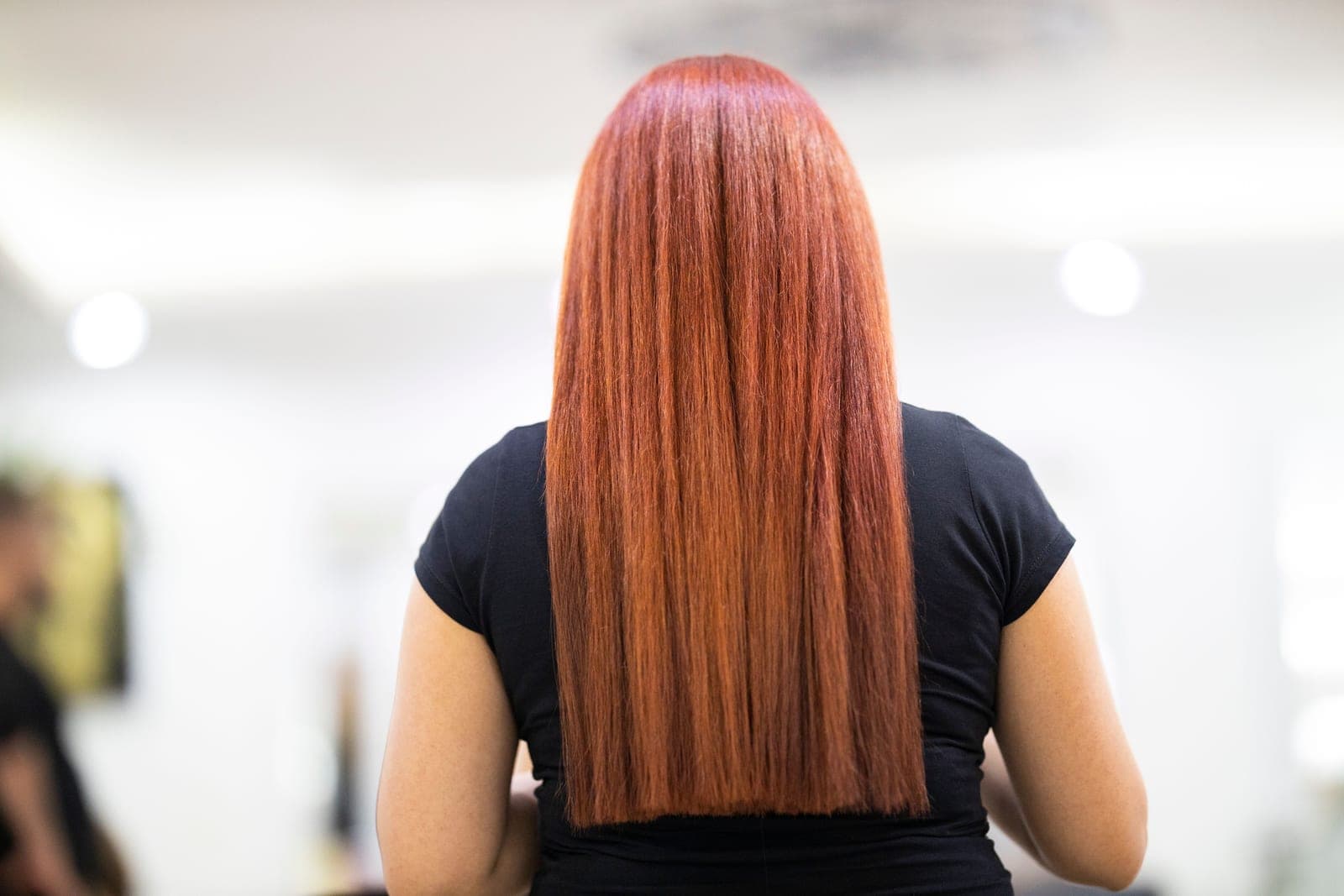Silk pressed straight hair in a salon
