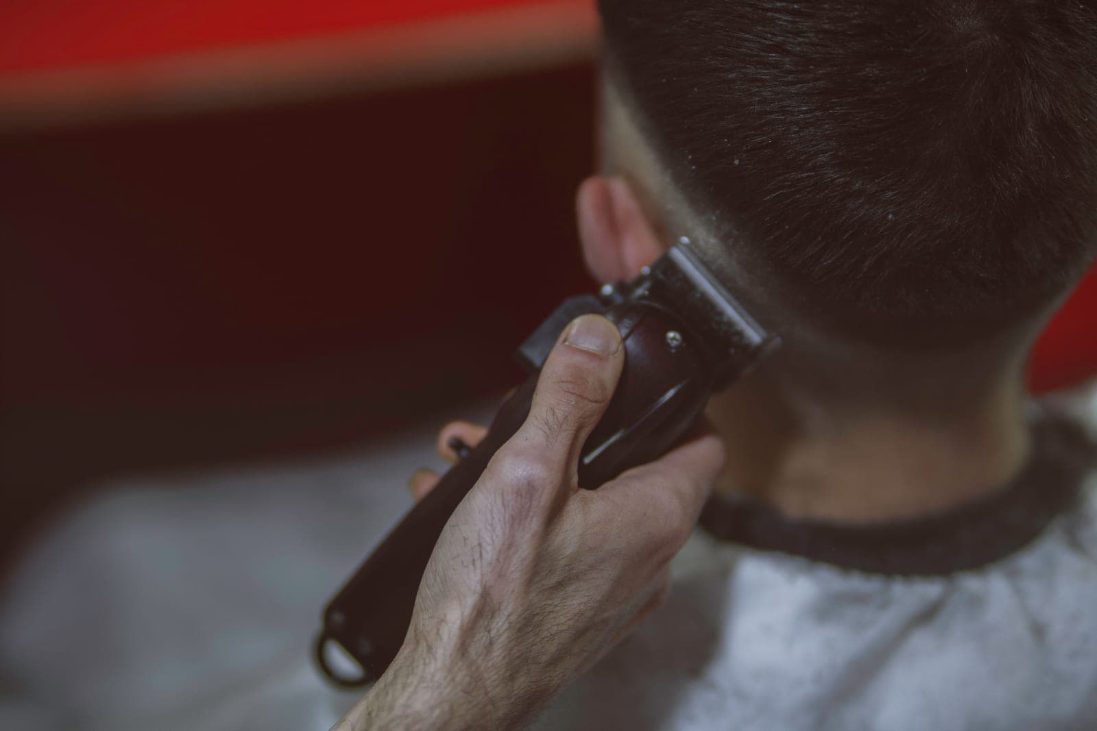 Hair clippers being used for a fade haircut