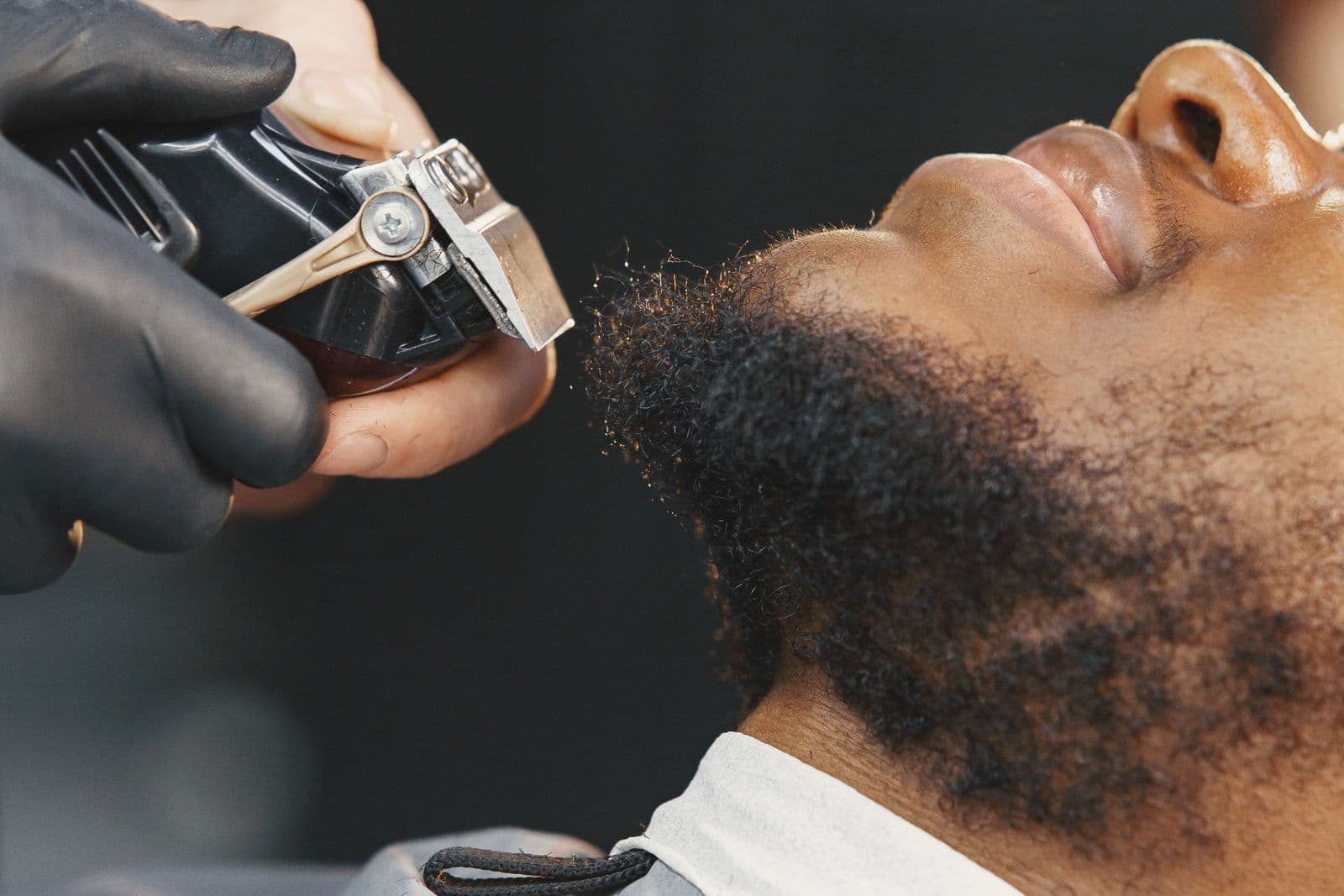 A close trim along the jaw and neck with a detail trimmer