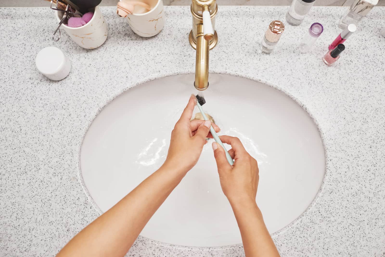 Hair care tools and products on a counter