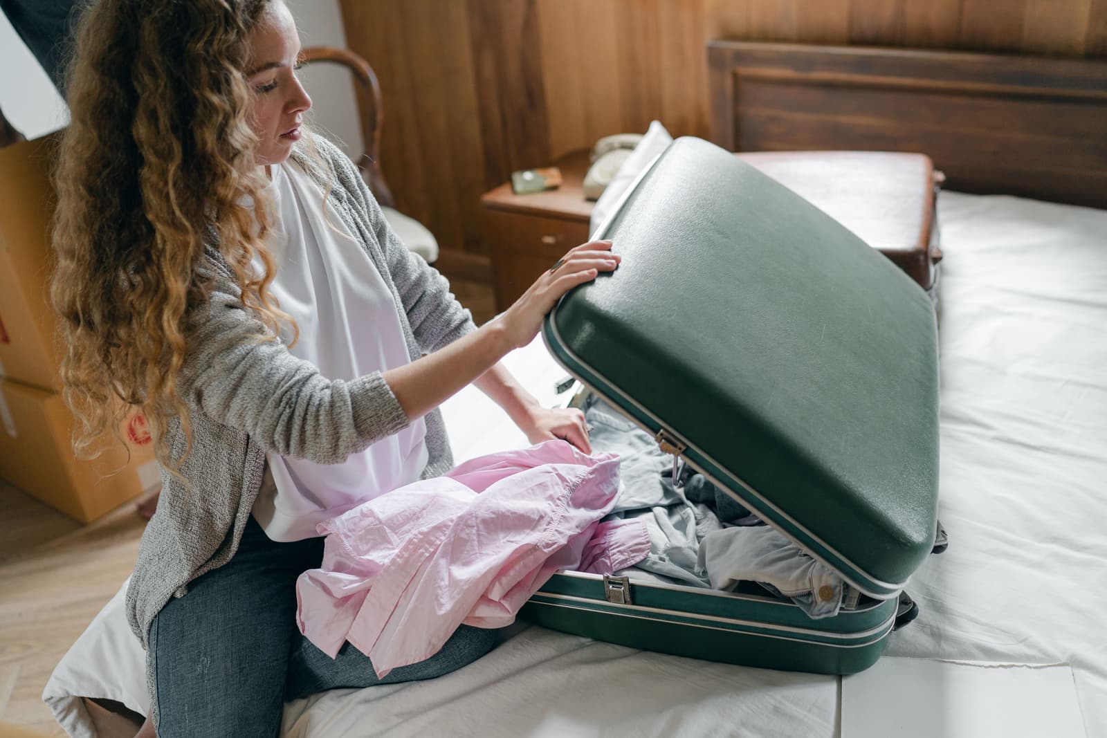 A suitcase being packed for a trip